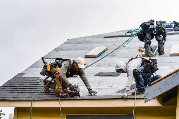 Professional Gutter Installation technician working in Laguna, NM